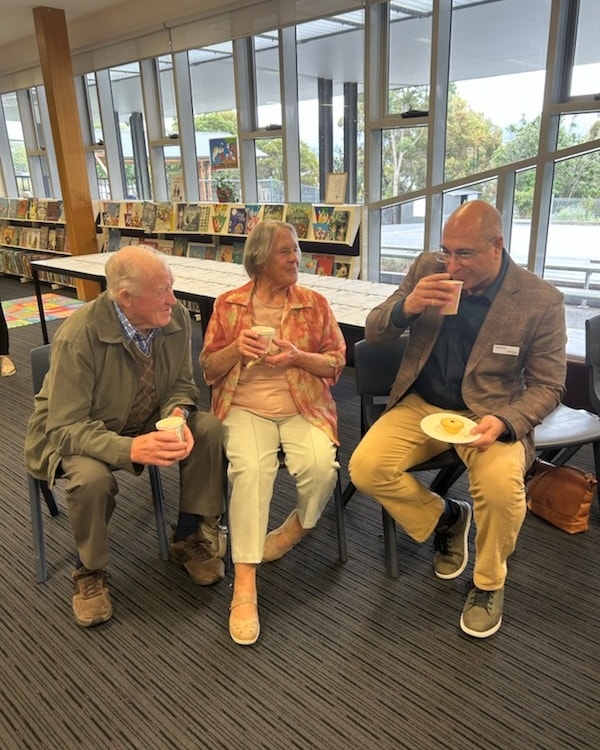 Aldo chatting with residents at the local library