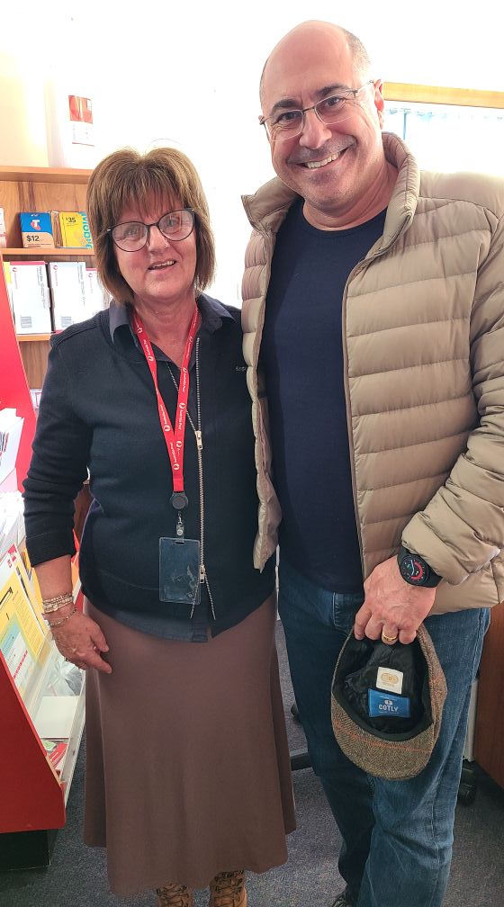 Aldo visiting Sheryl at the local post office
